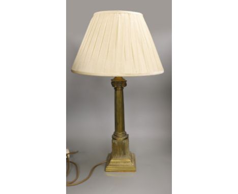 A brass Corinthian column table lamp