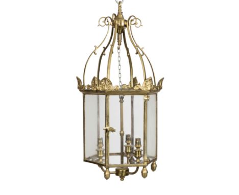 A Regency style brass and glazed hexagonal hall lanternWith scrolling supports, anthemion and scrolling foliate angles and ac