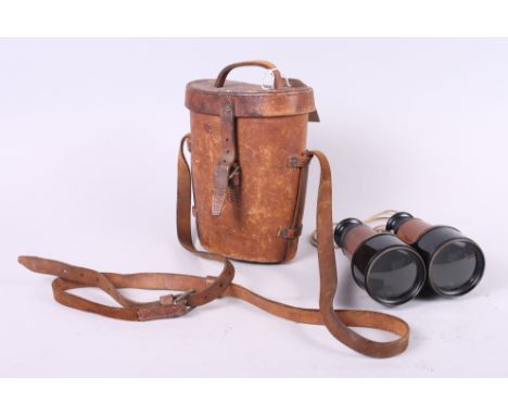 A pair of Officer's WWI field glasses / binoculars, by Hezzanith, barrel engraved broad-head arrow, 5.347584, in leather case