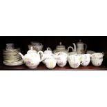 A Royal Worcester "Roanoke" pattern bone china tea service for twelve, including three teapots and a