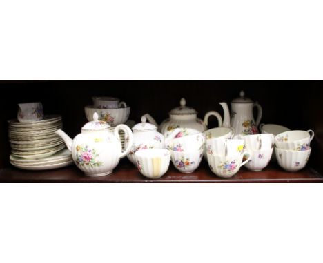 A Royal Worcester "Roanoke" pattern bone china tea service for twelve, including three teapots and a coffee pot
