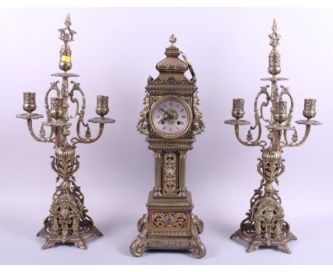 A brass clock garniture by Connard of Southport, clock 22" high