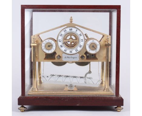 A limited edition Congreve rolling ball clock, by Devon Clocks, 316/500, in class case, 8 1/4" highCondition: Has two ball be
