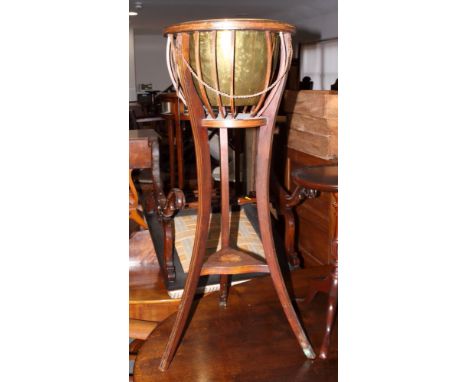 An Edwardian mahogany and inlaid jardiniere stand with brass basin, on splayed supports, 14" dia