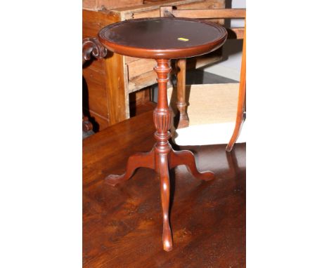 A polished as mahogany circular wine table, on turned column and tripod splay supports, 12" dia, and a yew drop flap occasion