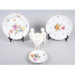 A 19th century Meissen plate decorated flowers, 9 1/2" dia, a smaller Meissen dish, another plate