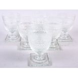 A set of six cut glass rummers of Georgian design, on square bases