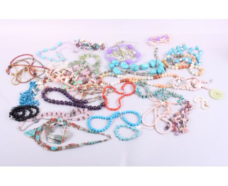 A collection of jade, amethyst and turquoise beaded necklaces and other hardstone jewellery, etc