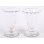 A pair of early 19th century cut glass custards, on circular feet, 4" high