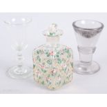 A 19th century ice cream lick, a cordial glass and a scent bottle with enamel decoration (damages)