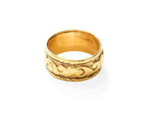 A Textured Band Ring, unmarked, finger size PGross weight 6.4 grams.