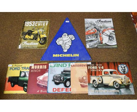 Seven Various Modern Car and Motorbike related advertising signs, together with a Michelin tyres enamel sign (8)