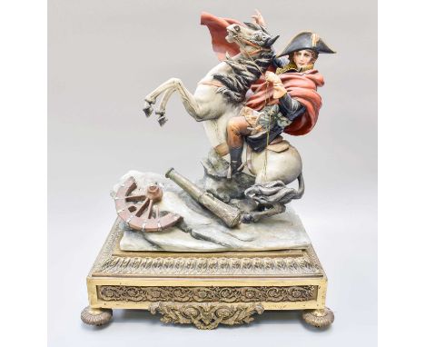 A Continental Coloured Bisque Figure, of Napoleon upon Marengo crossing the alps, raised on a gilt metal base, 36cm high