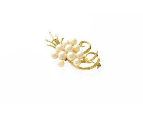 A Cultured Pearl Spray Brooch, by Mikimoto, measures 5.4cm by 3.3cmStamped '14K' and in our opinion would test as gold. Also 