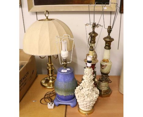 A Pair of Onyx Table Lamps, together with a brass three light table lamp, a Ruskin pottery lamp and two other ceramic based t