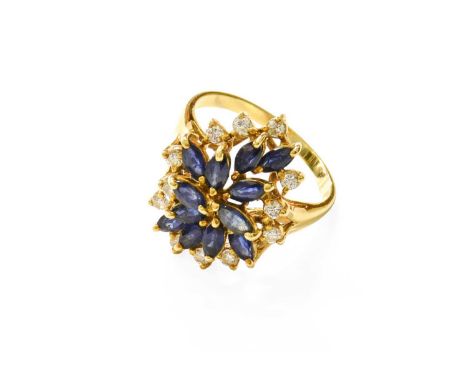 A Sapphire and Diamond Cluster Ring, the central cluster of marquise cut sapphires within a border of round brilliant cut dia