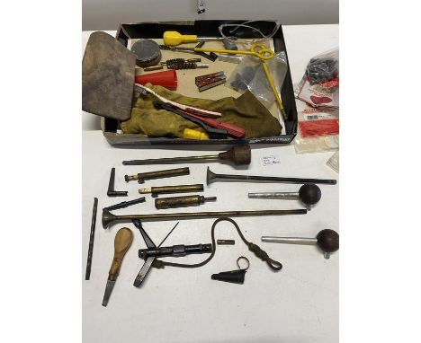 A selection of assorted gun related tools and accessories including black powder measure 