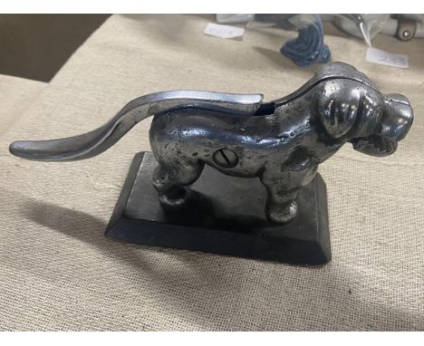 A vintage novelty dog form nut cracker 