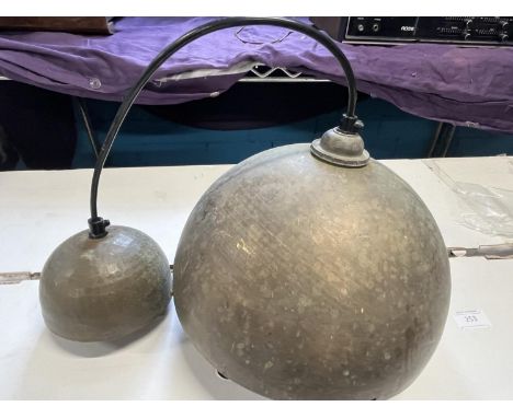 A vintage brass ceiling light 