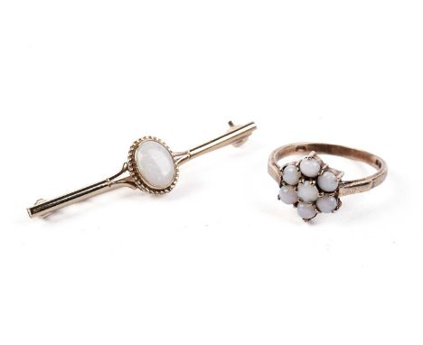 Opal jewellery, comprising; an opal cluster ring, on a 9ct gold shank, size M; and an opal bar brooch, on 9ct gold, 4.1g gros