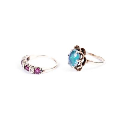 A diamond and ruby ring, in 9ct yellow gold, size N; and an opal triplet and 9ct gold dress ring, 4.7g gross.