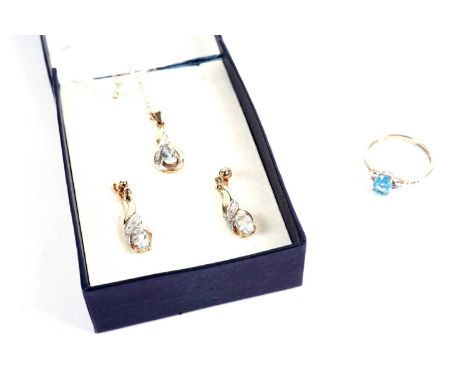 A topaz and diamond dress ring, in 9ct yellow gold, size O 1/2, 1.3g gross; together with a topaz and diamond drop pendant an
