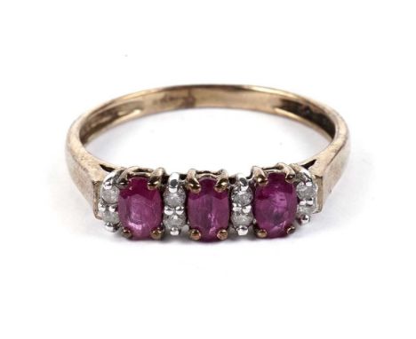 A ruby and diamond ring, in 9ct yellow gold mount and shank, ring size T, 2.0g gross.