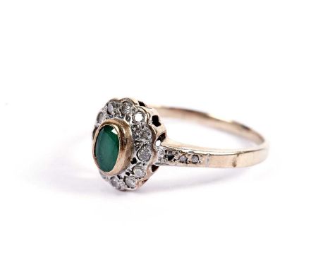 An emerald and diamond ring, in 9ct yellow gold mount and shank, ring size T, 2.5g gross.