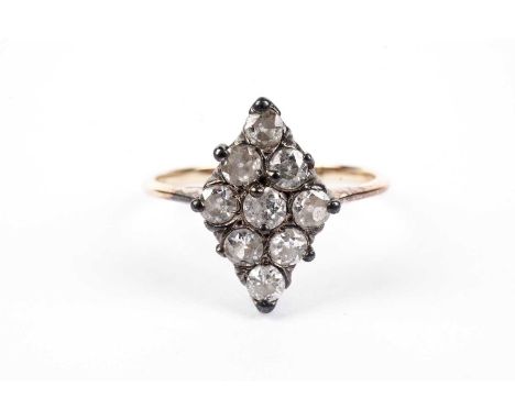 A diamond ring, set with nine mine-cut diamonds in a diamond-shaped mount, on gold shank, ring size K, 2.3g gross.