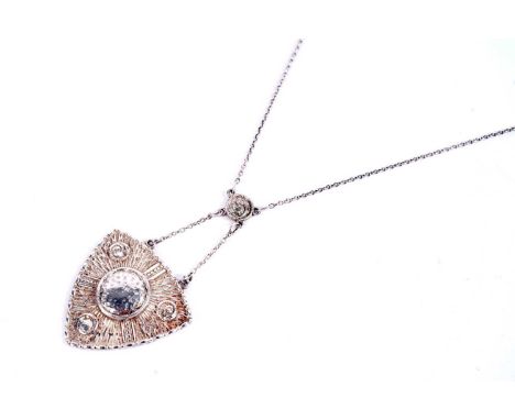 An Edwardian Arts and Crafts silver pendant, by Charles Horner, Chester 1910, of Celtic design, on cable link chain.