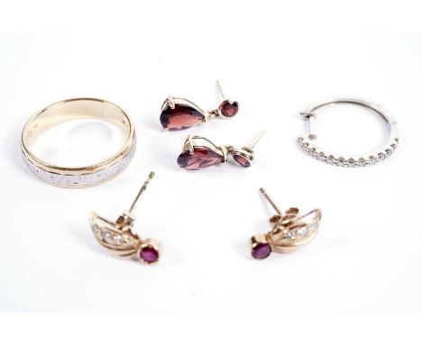Earrings and a ring, including a pair of ruby and diamond stud earrings, and an 18ct gold and platinum wedding band, ring 5g 