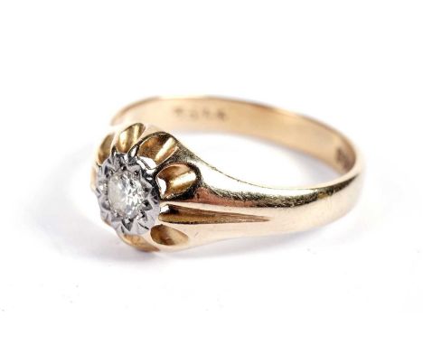 A single-stone diamond ring, illusion-set in white metal, on an 18ct gold shank, size S, 5.1g gross.