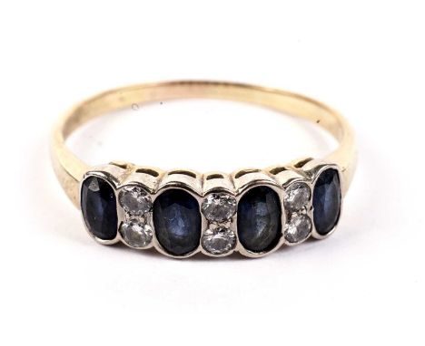 A sapphire and diamond dress ring, in 18ct gold mount and shank, ring size X, 4.2g gross.