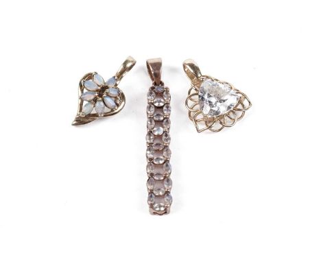 Three gold pendants, comprising: an opal and diamond heart pendant, in 9ct yellow gold, 1.8g gross; a 14ct yellow gold trilli