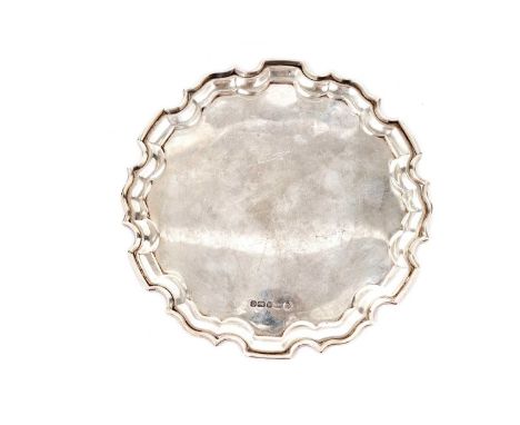 An Elizabeth II silver waiter by Carr's of Sheffield Ltd, Sheffield, 2002, with Chippendale rim, 15cms diameter, 5.2toz gross