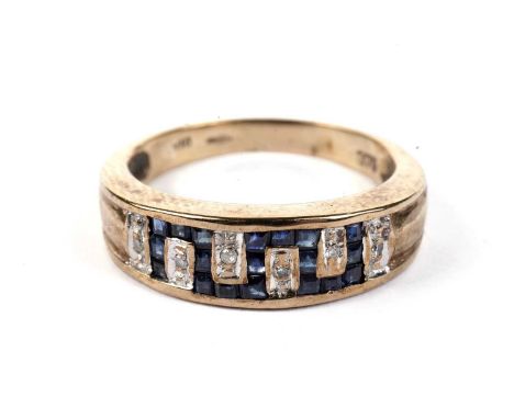 A sapphire and diamond dress ring, in Greek-key design, 9ct yellow gold mount and shank, ring size M, 3.3g gross.