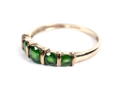 A five-stone chrome diopside ring, in 9ct yellow gold mount and shank, ring size V, 2.4g gross.
