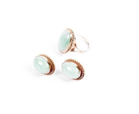 A jade dress ring, in 9ct yellow gold, size Q, 4.2g gross; and a pair of jade earrings, in 9ct gold, 4.6g gross.