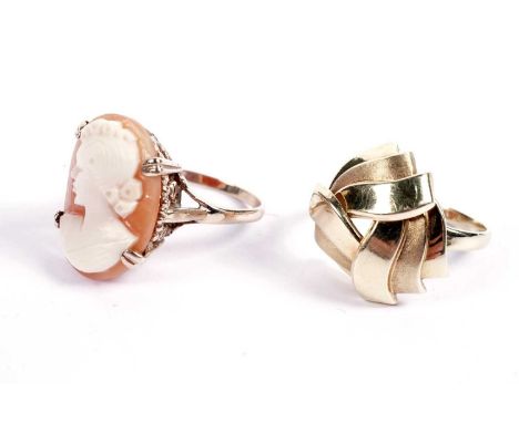 A cameo ring, on a 9ct gold shank, size P, 4.8g gross; and a gold knot pattern ring, stamped "Germany 14K", size O, 3.6g gros