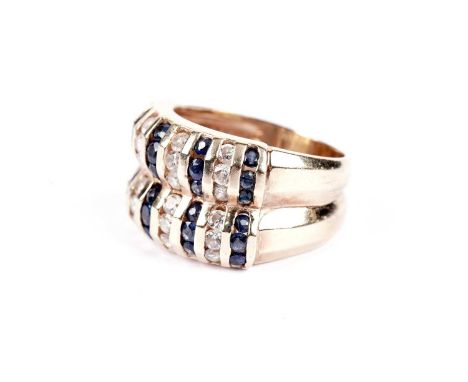 A sapphire and diamond dress ring, in yellow gold, stamped "14K", size L, 7.6g gross.