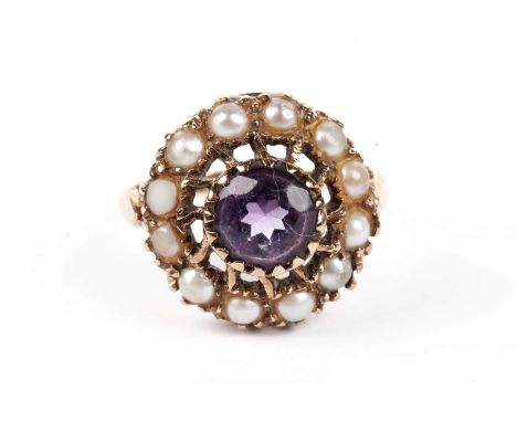 An amethyst and pearl cluster ring, in 9ct yellow gold mount and shank, ring size J, 3.4g gross.