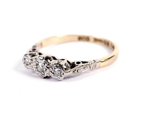 A diamond trilogy ring, in platinum setting and 18ct yellow gold shank, size O, 2.7g gross.