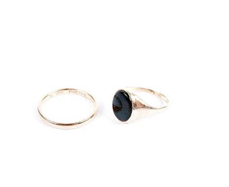 A bloodstone signet ring, in yellow gold, stamped “18ct”, size N, 3.0g gross; and an 18ct yellow gold wedding band, size P 1/