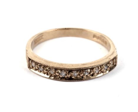 A diamond half hoop eternity ring, in 9ct yellow gold, size O, 2.4g gross.