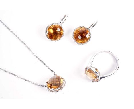 A suite of citrine and diamond cluster jewellery by Zen Diamond, comprising: a dress ring; a pair of drop earrings; and a pen