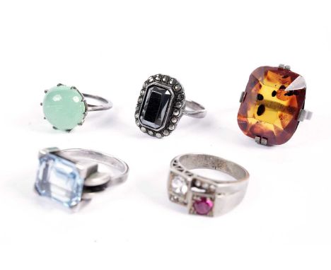 Costume jewellery rings, including: a blue topaz dress ring of Art Deco influence, size L; and a hematite and marcasite ring,