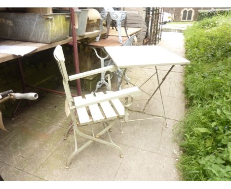 A vintage style steel framed light green painted  folding garden armchair with timber slatted seat, rail back and arm rests, 