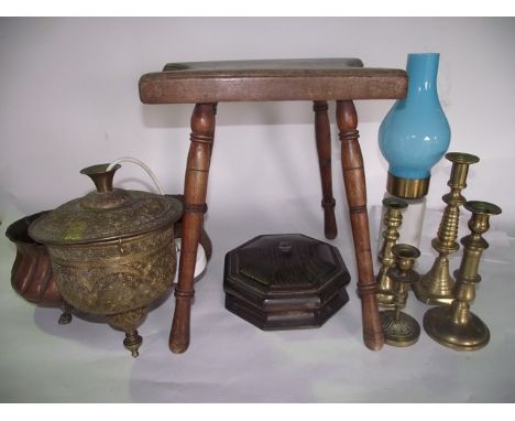 A miscellaneous collection to include a copper vessel of oval form with shaped bowl raised on four paw supports, various bras