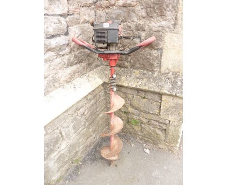 A petrol driven power drill (hole borer) manufactured by Ardisam, model number 8900, serial number 42683 with Tecumseh TC2 en