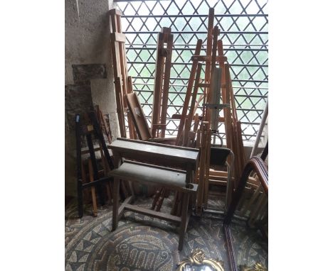 A quantity of mainly contemporary artist's easels of varying size, floor standing and portable, mainly with light beechwood f